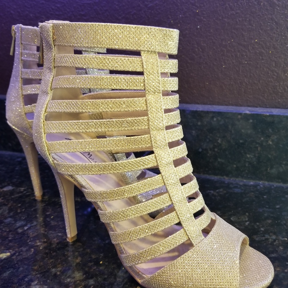 Gold stiletto heels